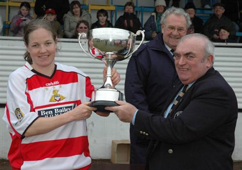 Doncaster Belles: Vicky Lifts Trophy